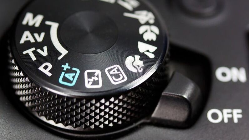 DSLR camera dial for setting shooting modes