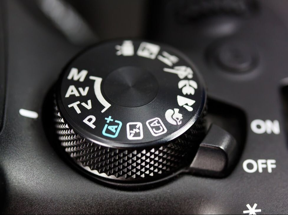 Camera dial for setting the shooting mode used to demonstrate some of the modes you learn in this phtography class